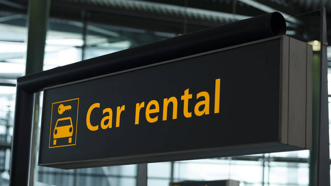 Car rental sign at the airport